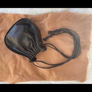 Vintage 70s/80s Halston drawstring pouch bag. Classic style, soft brown leather.
